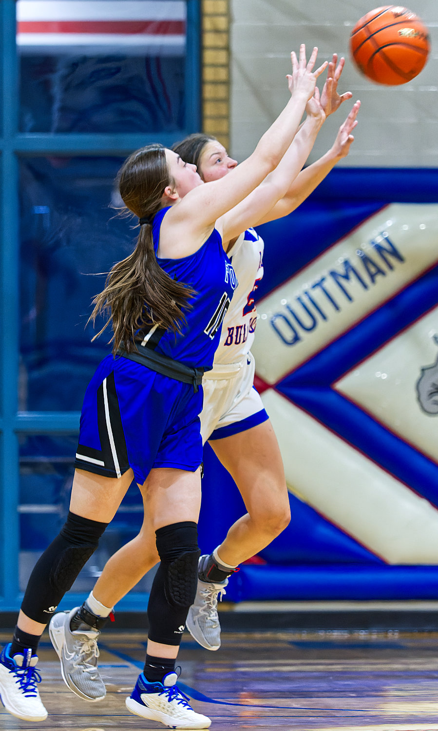 Madyson Pence steals the ball from Quinlan-Ford, which she would take all the way to the hoop. [see more shots, buy basketball photos]
